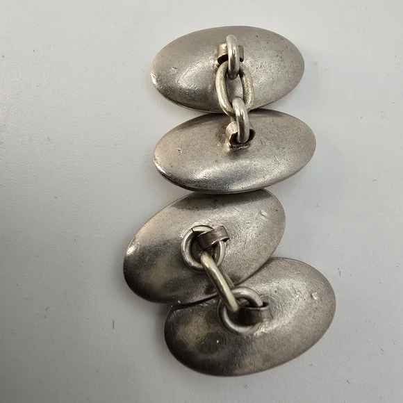 1920s antiqie mother of pearl and white enamel cufflinks.